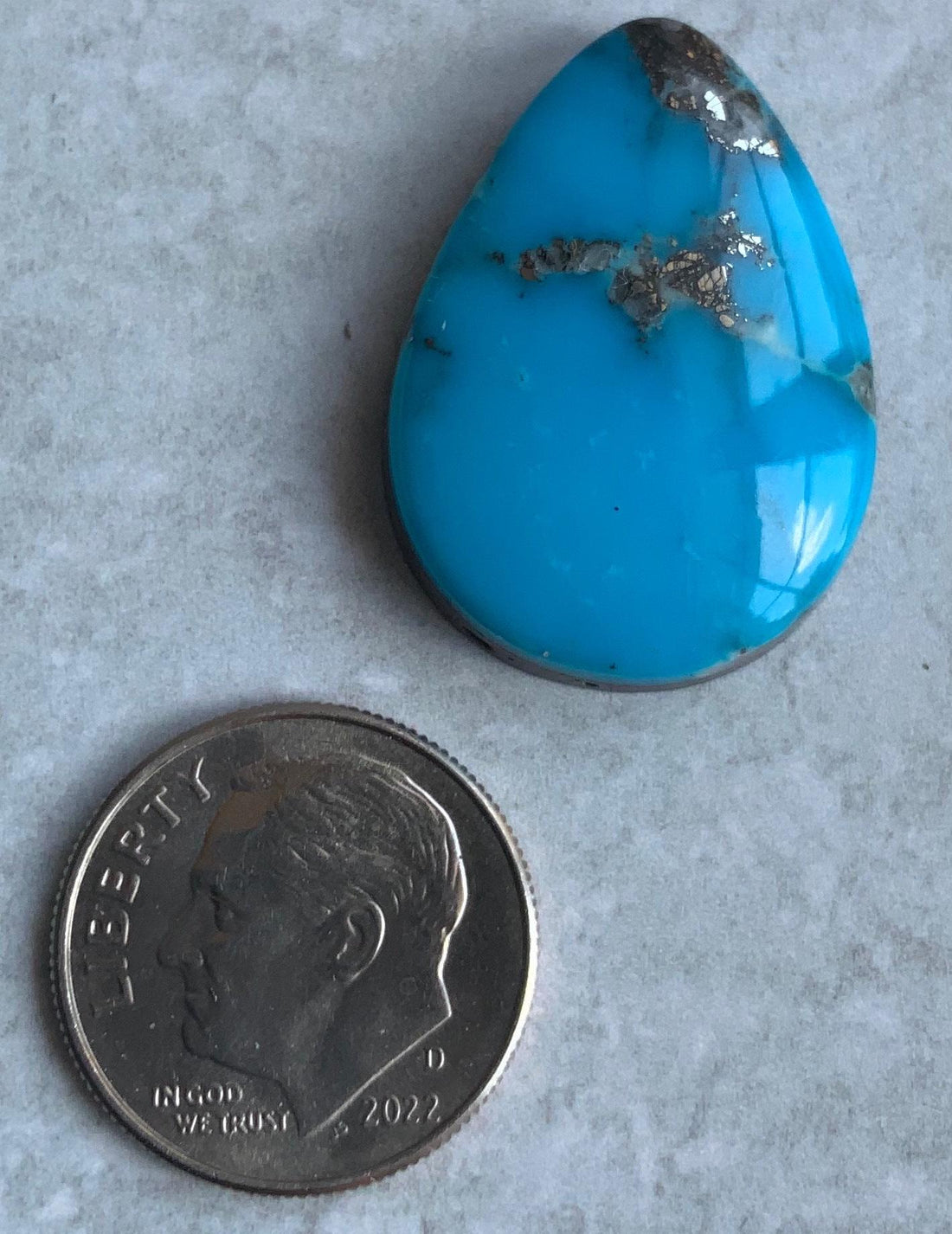 Ithaca Peak Turquoise High Grade Teardrop Cabochon With Pyrite #110