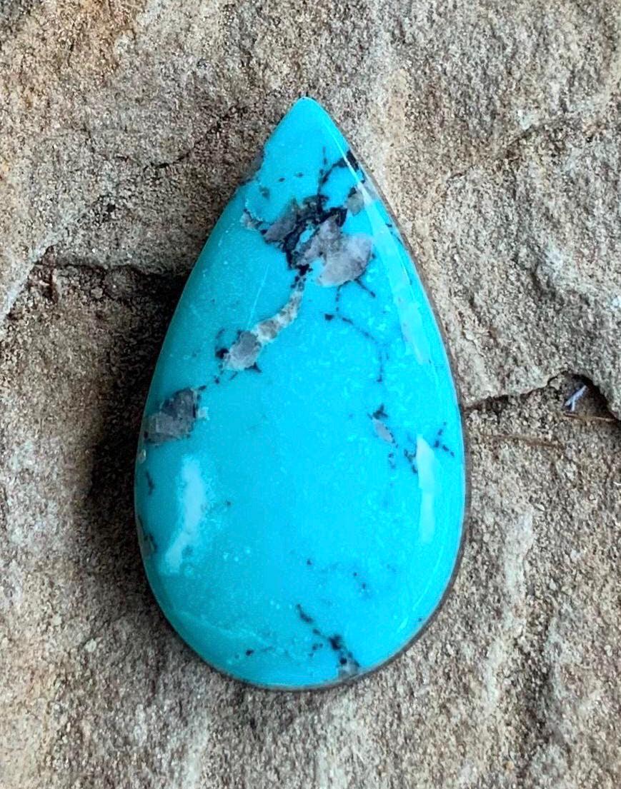 High Grade Ithaca Peak Turquoise Teardrop Cabochon With Quartz Inclusions