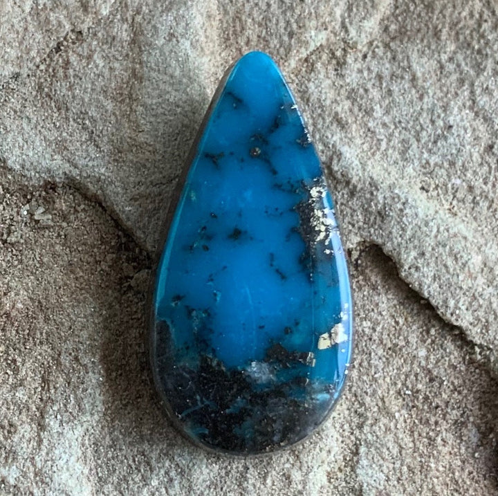 High Grade Ithaca Peak Turquoise Teardrop Cabochon With Pyrite & Quartz Inclusions IP115