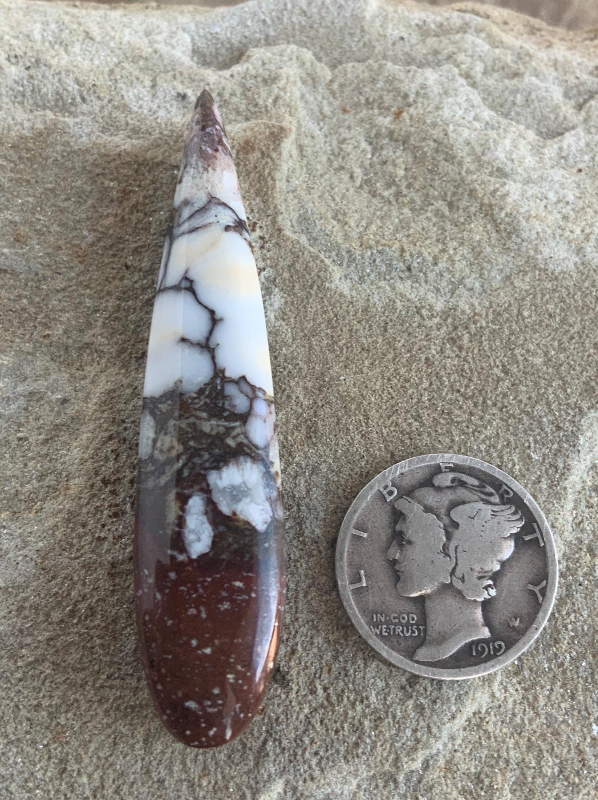 Incredible Wild Horse Magnesite Talon Cabochon