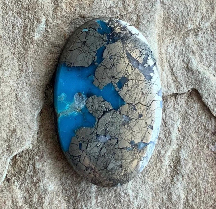 Incredible High Grade Ithaca Peak Turquoise Oval Cabochon Loaded With Silver Pyrite IP116