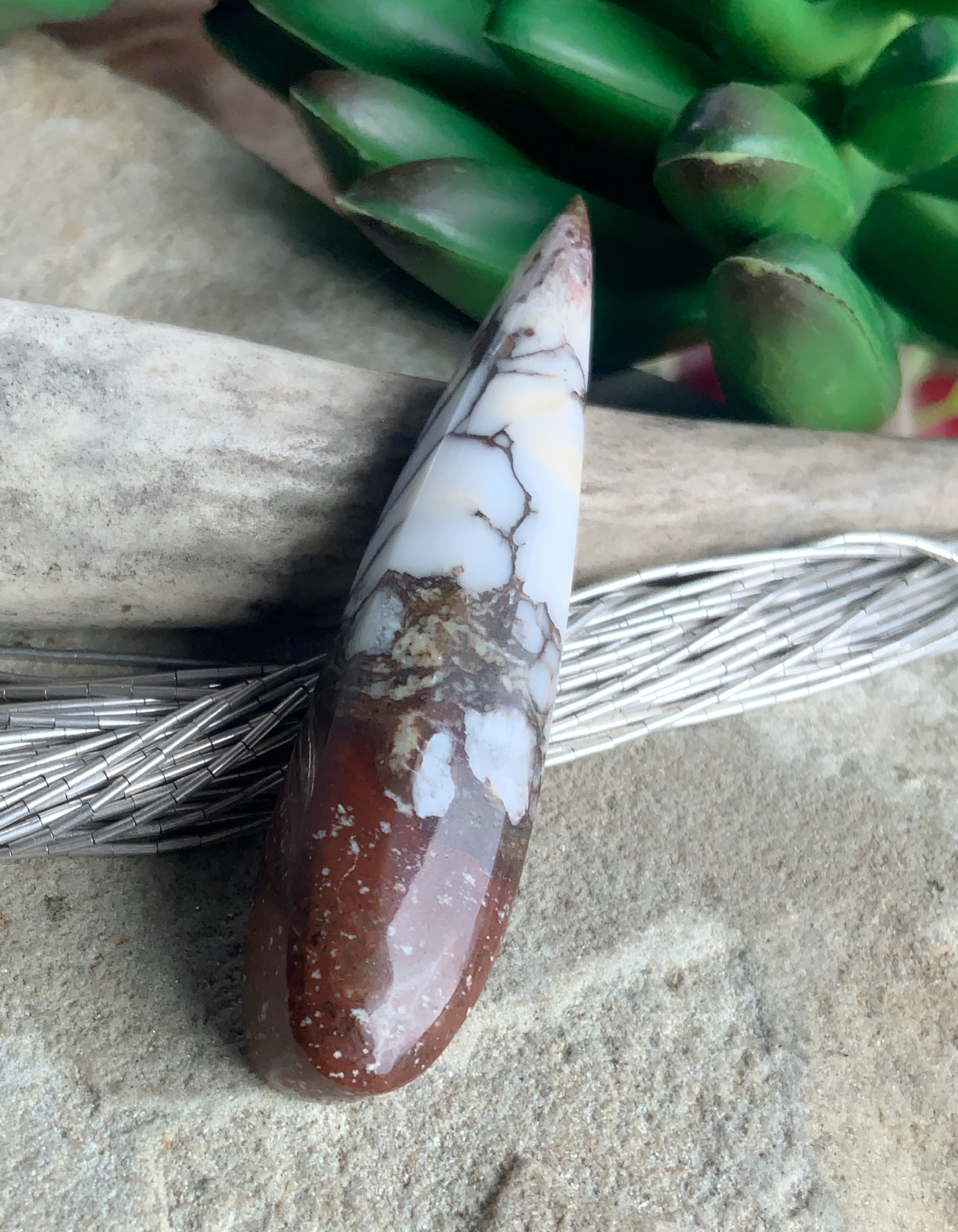 Incredible Wild Horse Magnesite Talon Cabochon