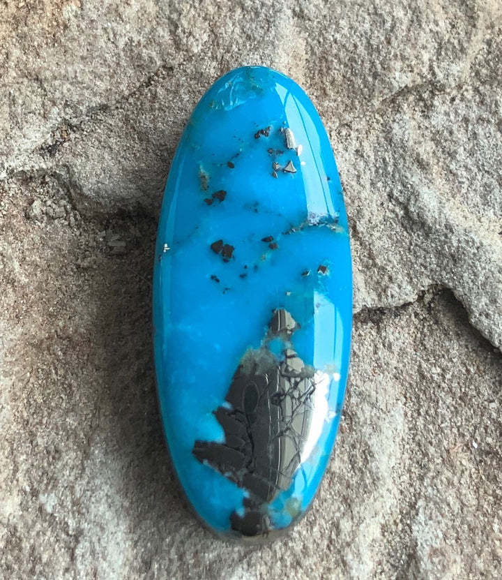 Beautiful Blue High Grade Ithaca Peak Turquoise Long Oval Cabochon With Silver Pyrite