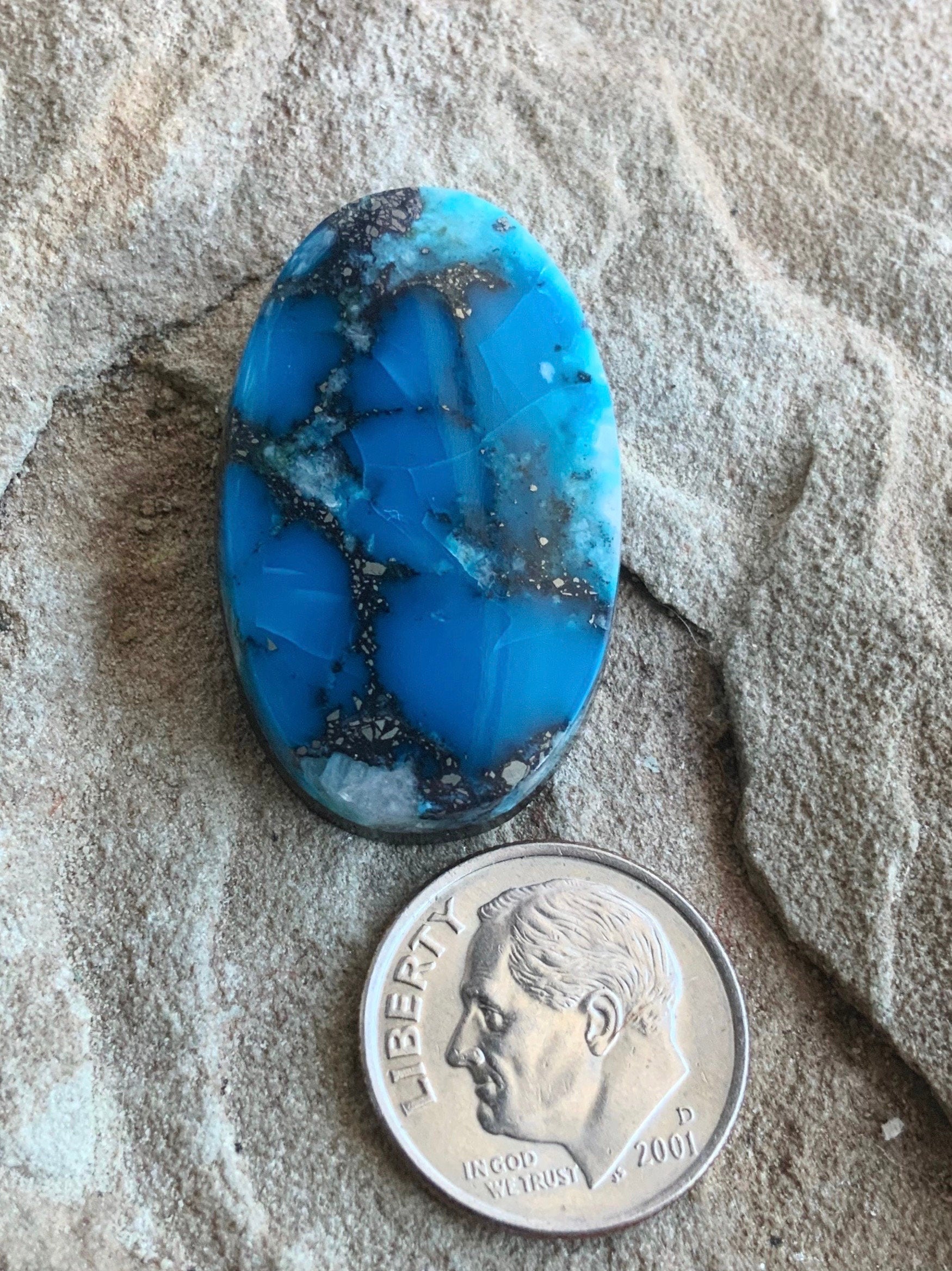 High Grade Ithaca Peak Turquoise Oval Cabochon With Quartz & Pyrite Inclusions