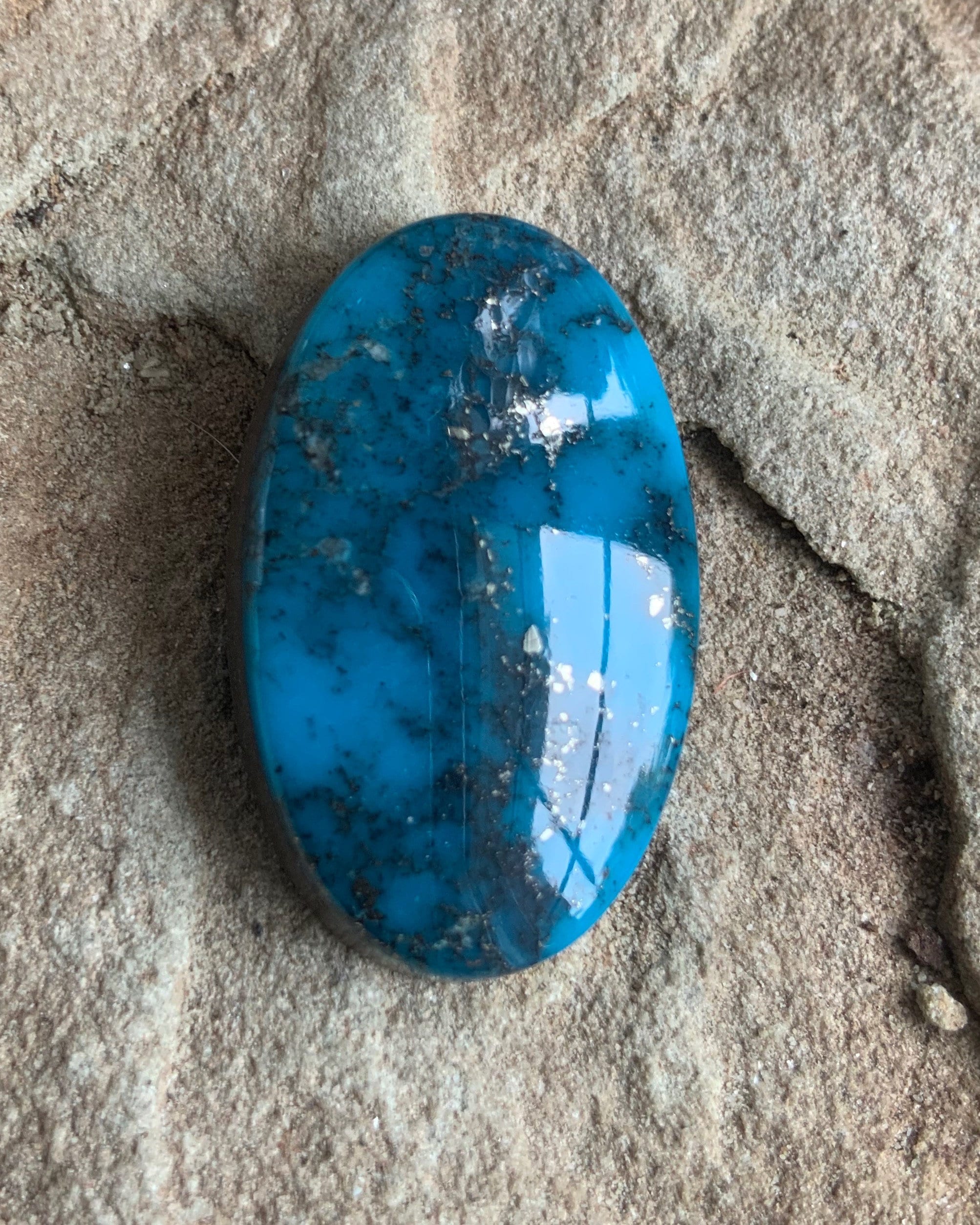 Blue High Grade Ithaca Peak Turquoise Oval Cabochon With Silver Pyrite