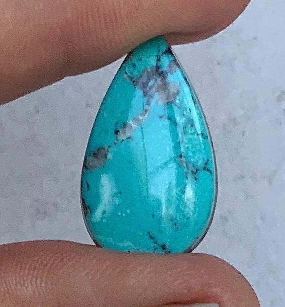 High Grade Ithaca Peak Turquoise Teardrop Cabochon With Quartz Inclusions