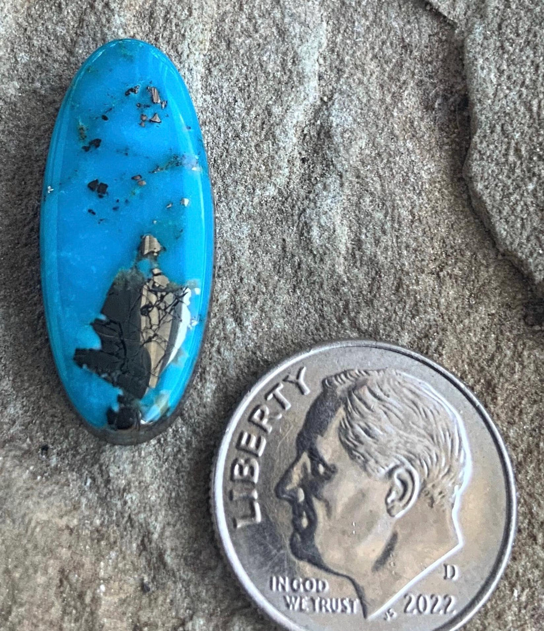 Beautiful Blue High Grade Ithaca Peak Turquoise Long Oval Cabochon With Silver Pyrite