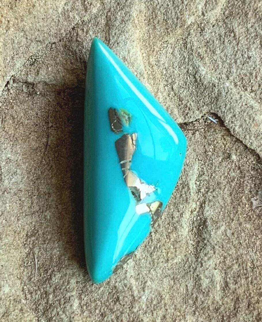 Beautiful Thick Cut Ithaca Peak Triangular Cabochon With Pyrite 253