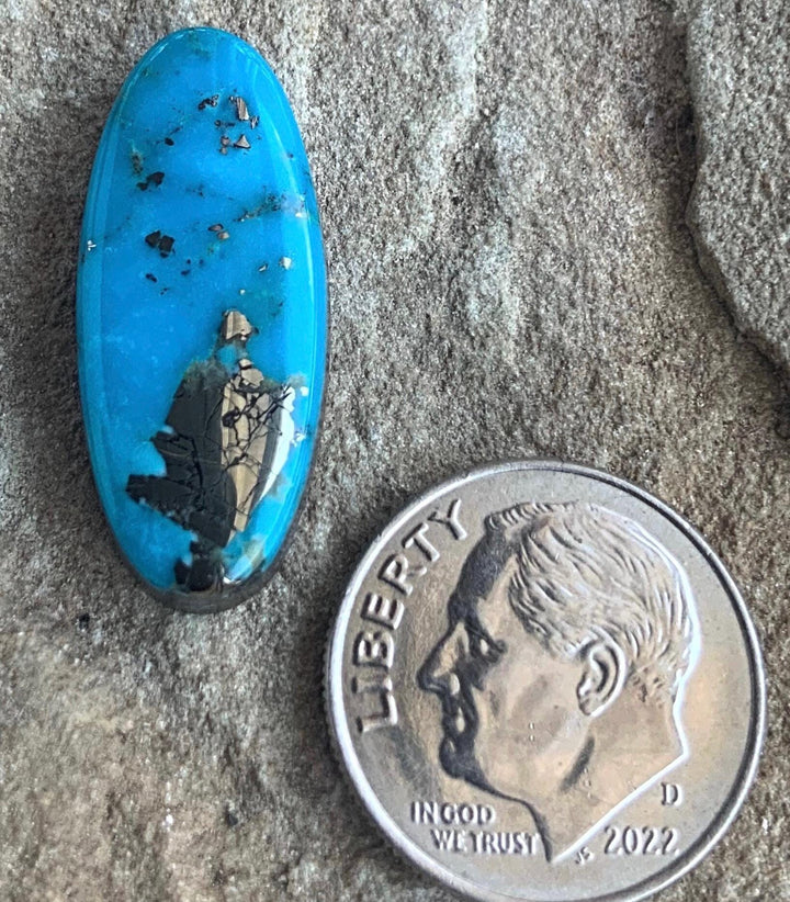 Beautiful Blue High Grade Ithaca Peak Turquoise Long Oval Cabochon With Silver Pyrite
