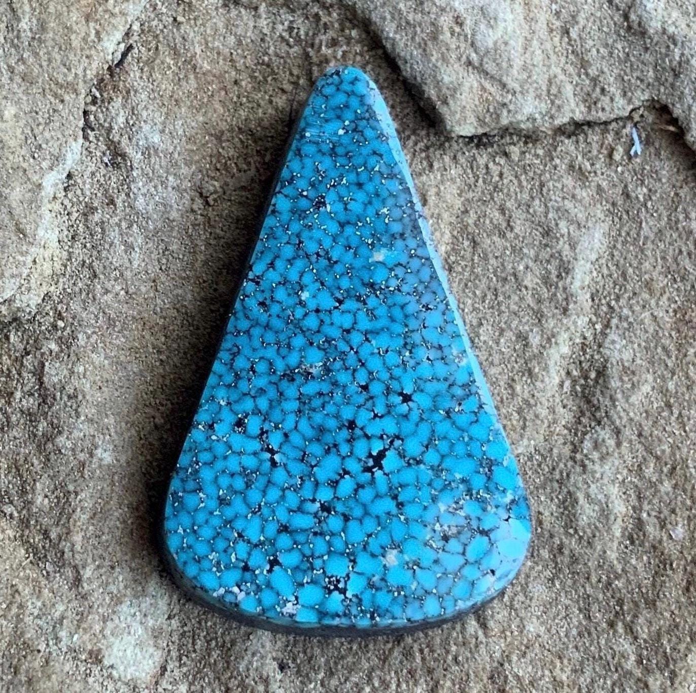 High Grade Black Web Kingman Turquoise Triangular Cabochon