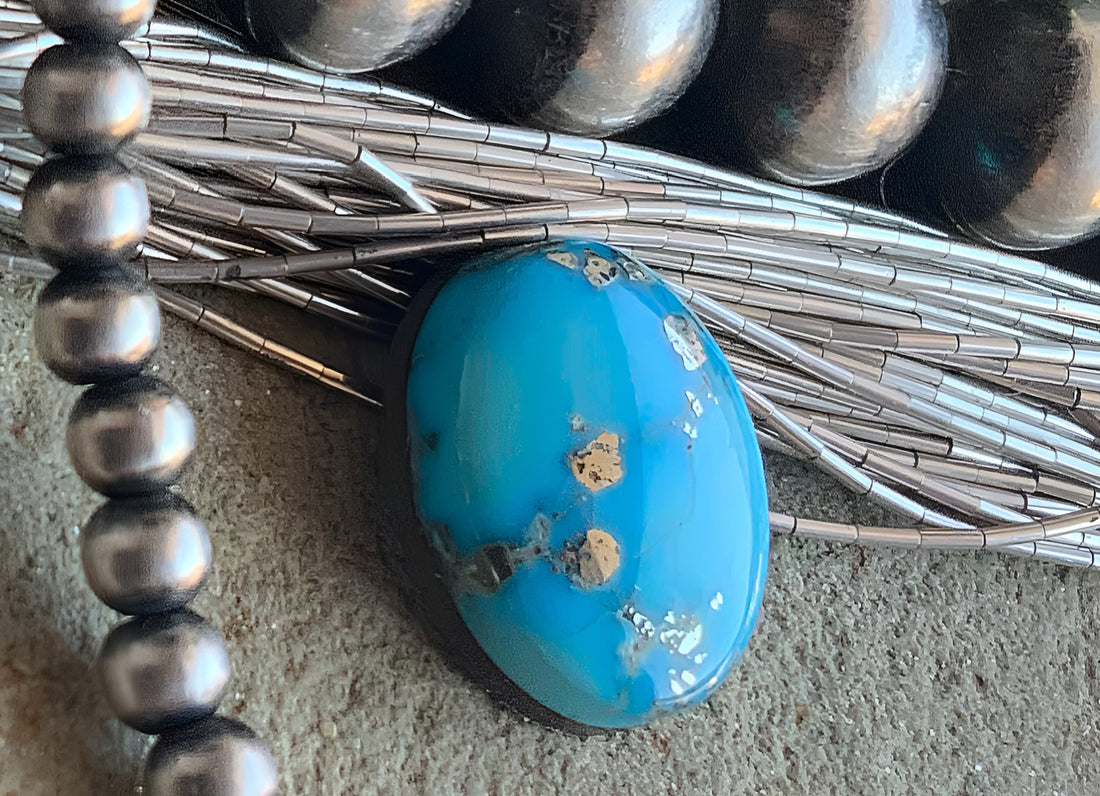 Whitewater Turquoise Oval With Silver Pyrite