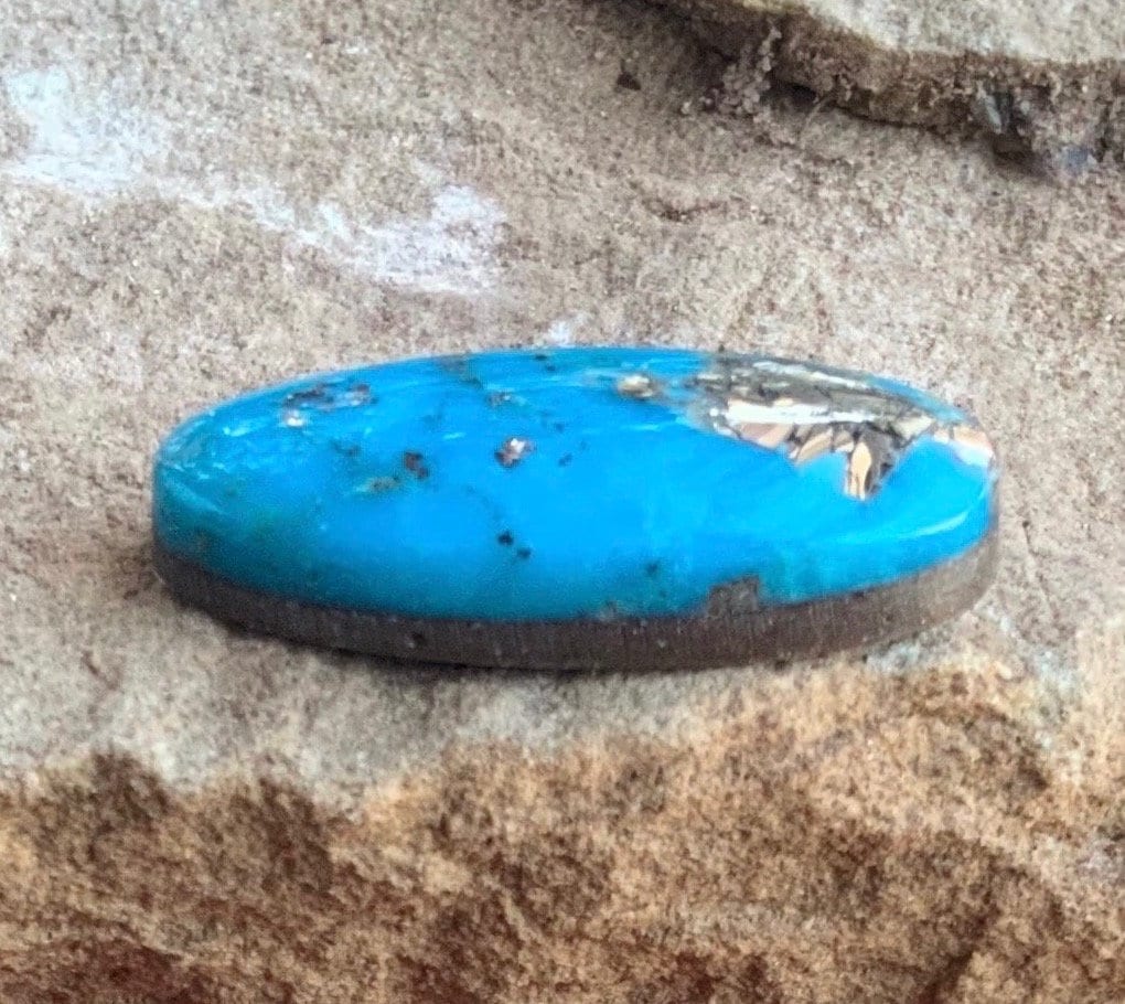 Beautiful Blue High Grade Ithaca Peak Turquoise Long Oval Cabochon With Silver Pyrite
