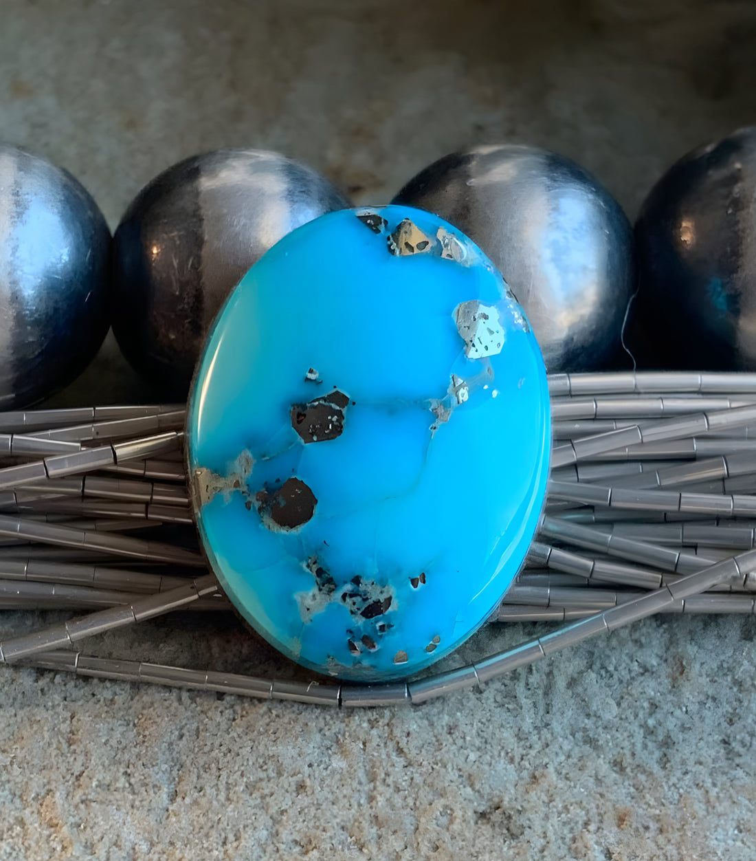 Whitewater Turquoise Oval With Silver Pyrite