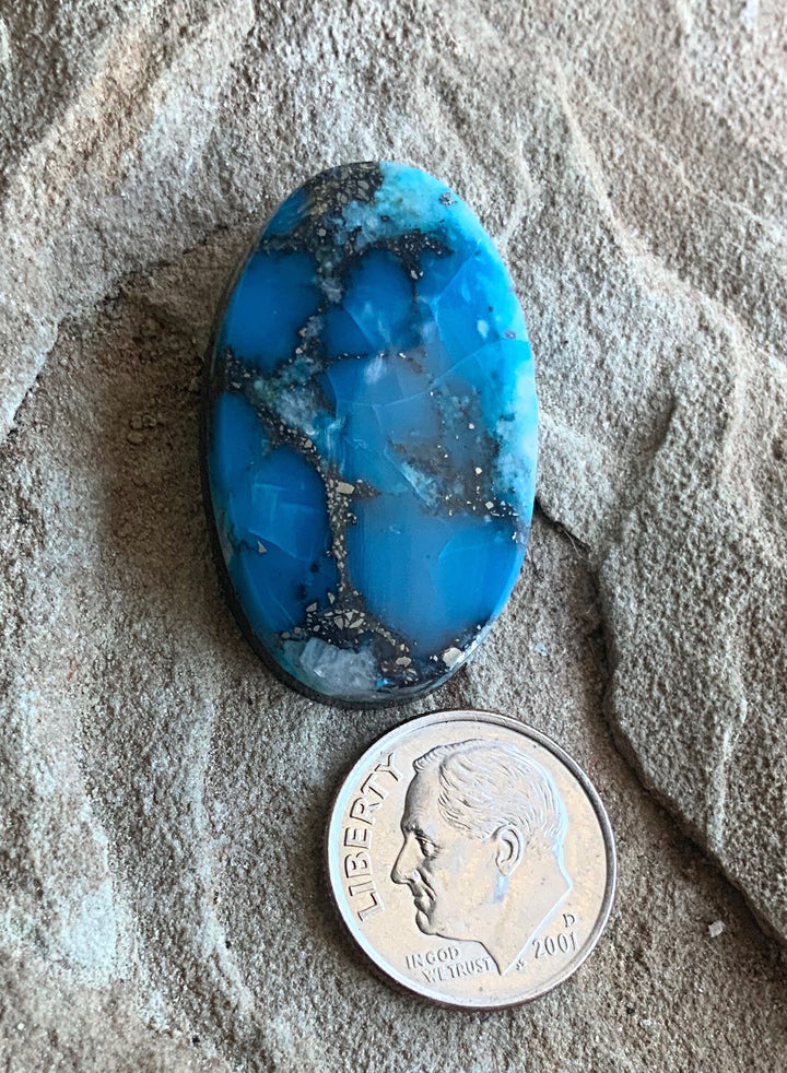 High Grade Ithaca Peak Turquoise Oval Cabochon With Quartz & Pyrite Inclusions