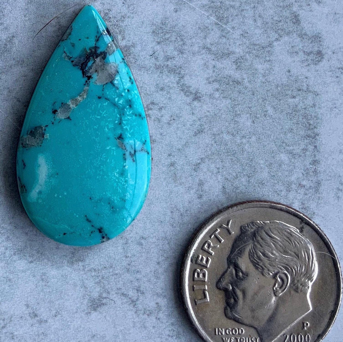 High Grade Ithaca Peak Turquoise Teardrop Cabochon With Quartz Inclusions
