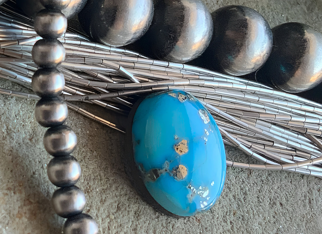 Whitewater Turquoise Oval With Silver Pyrite