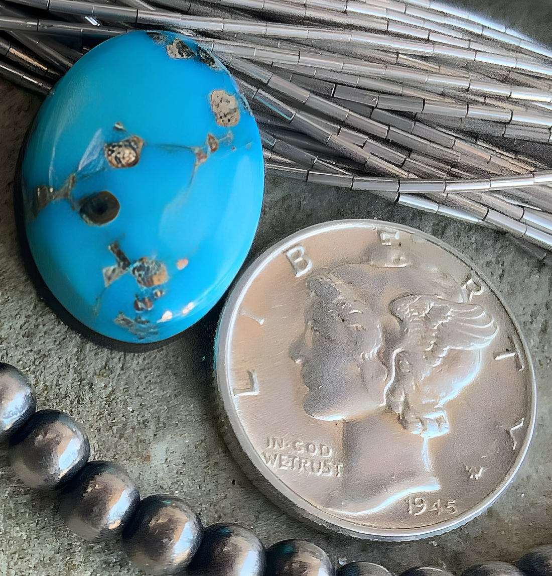 Whitewater Turquoise Oval With Silver Pyrite