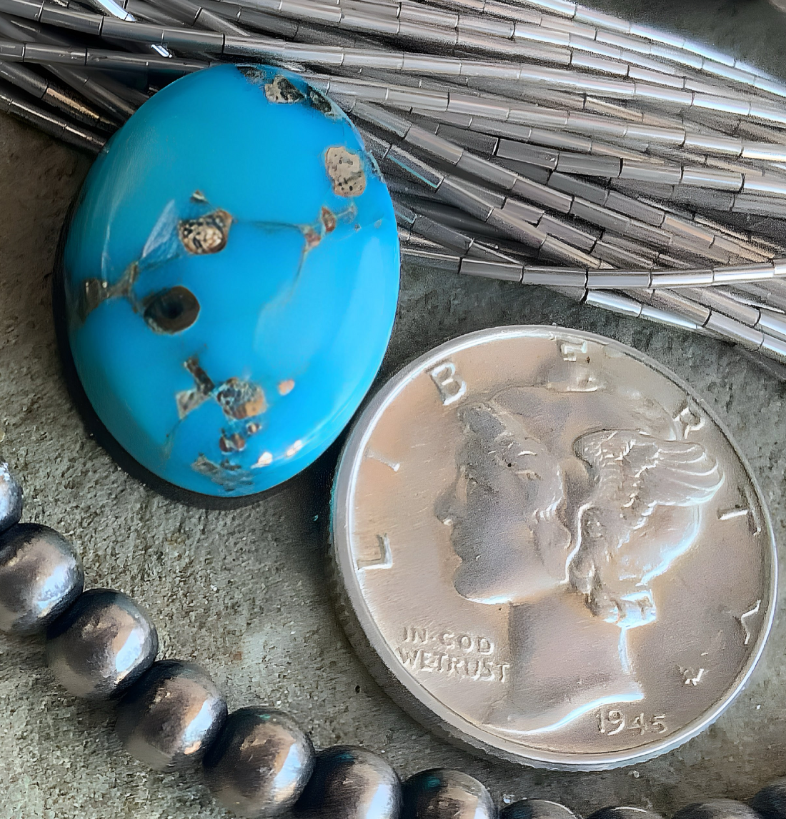 Whitewater Turquoise Oval With Silver Pyrite