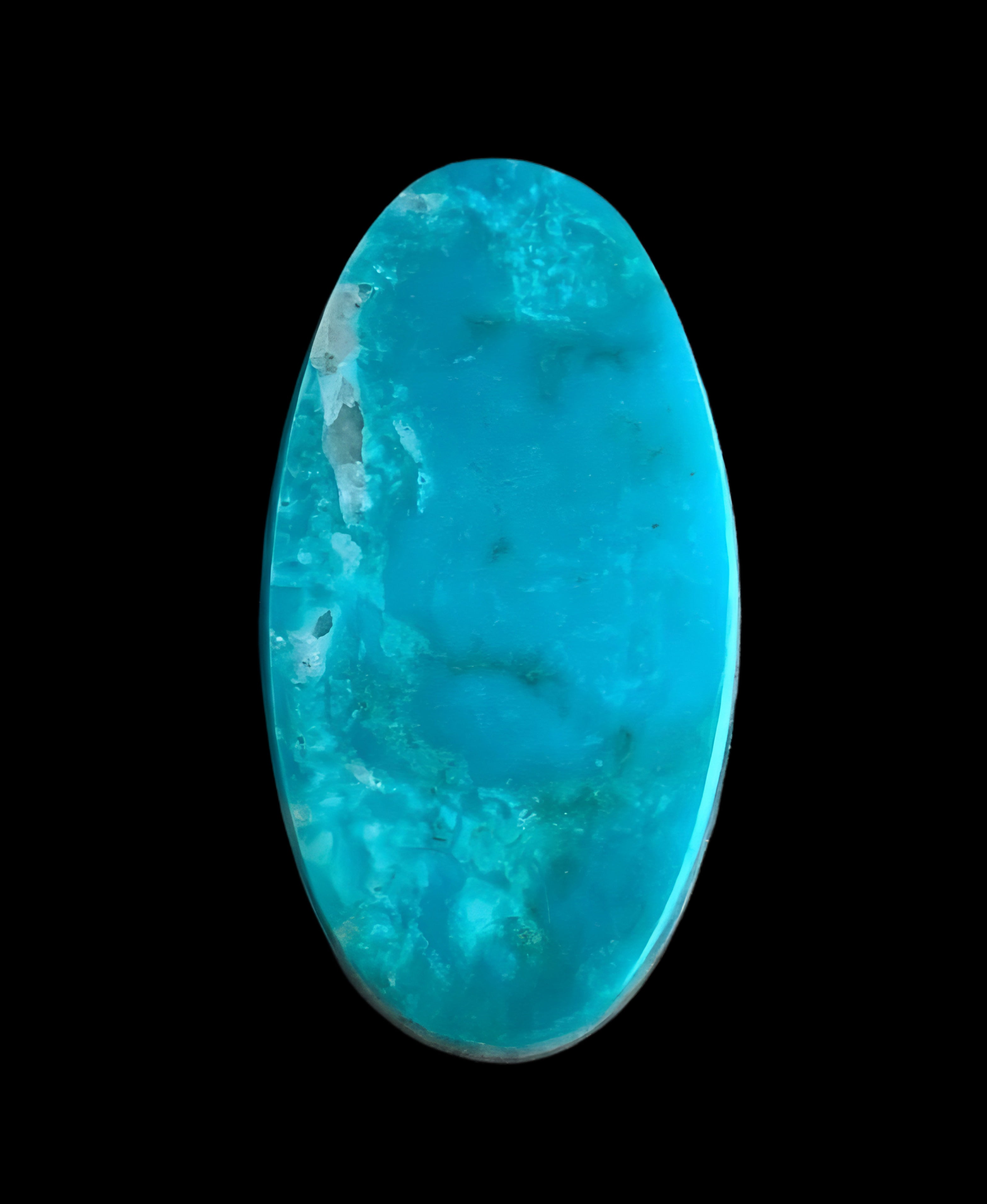 Turquoise Mountain Turquoise Oval Cabochon With Quartz Inclusions