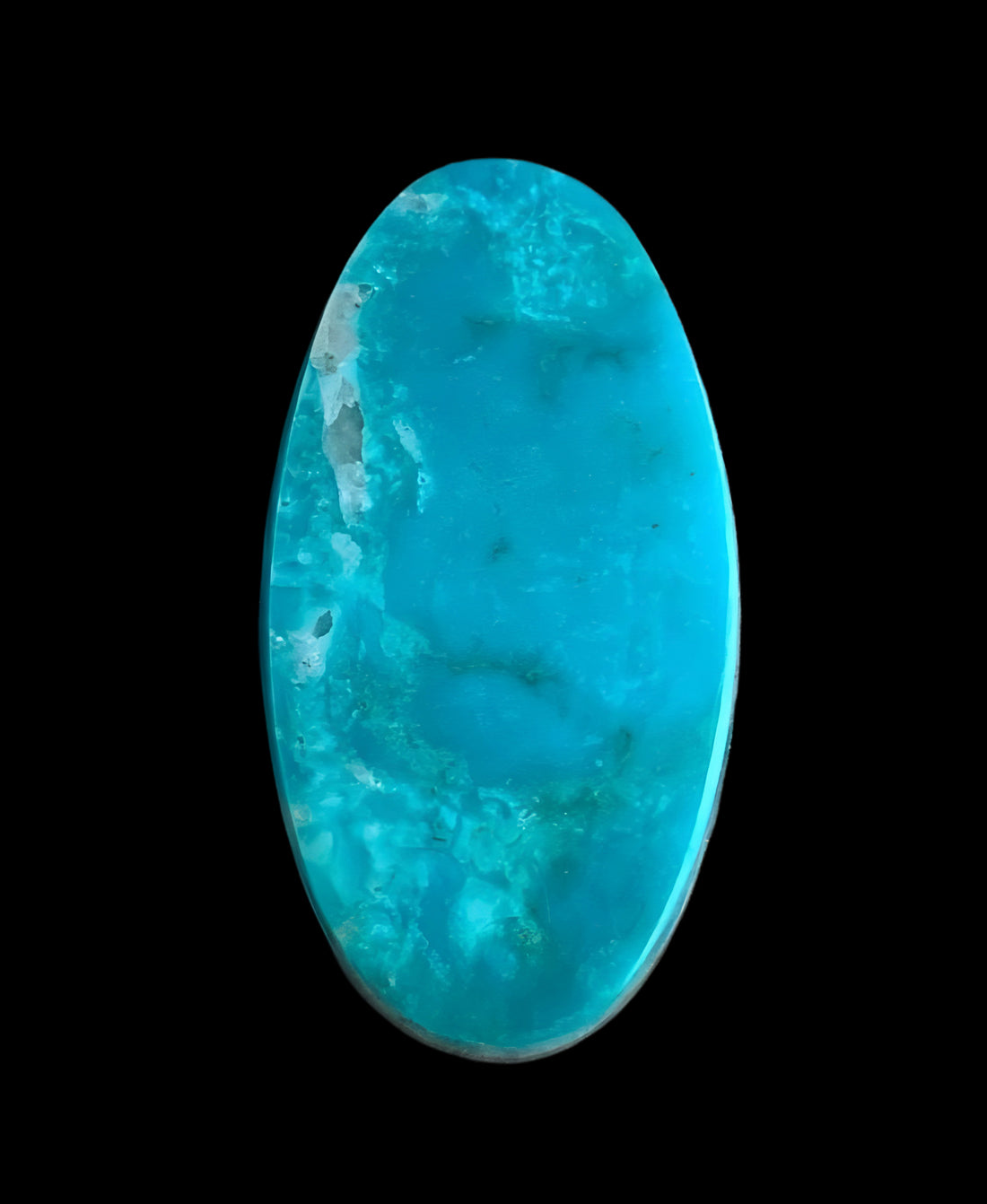 Turquoise Mountain Turquoise Oval Cabochon With Quartz Inclusions