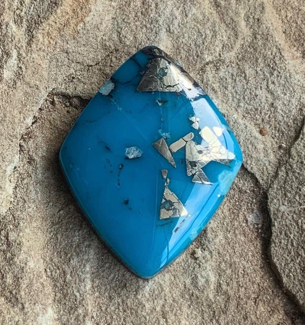 Large High Grade Ithaca Peak Turquoise Cabochon with Pyrite IP258