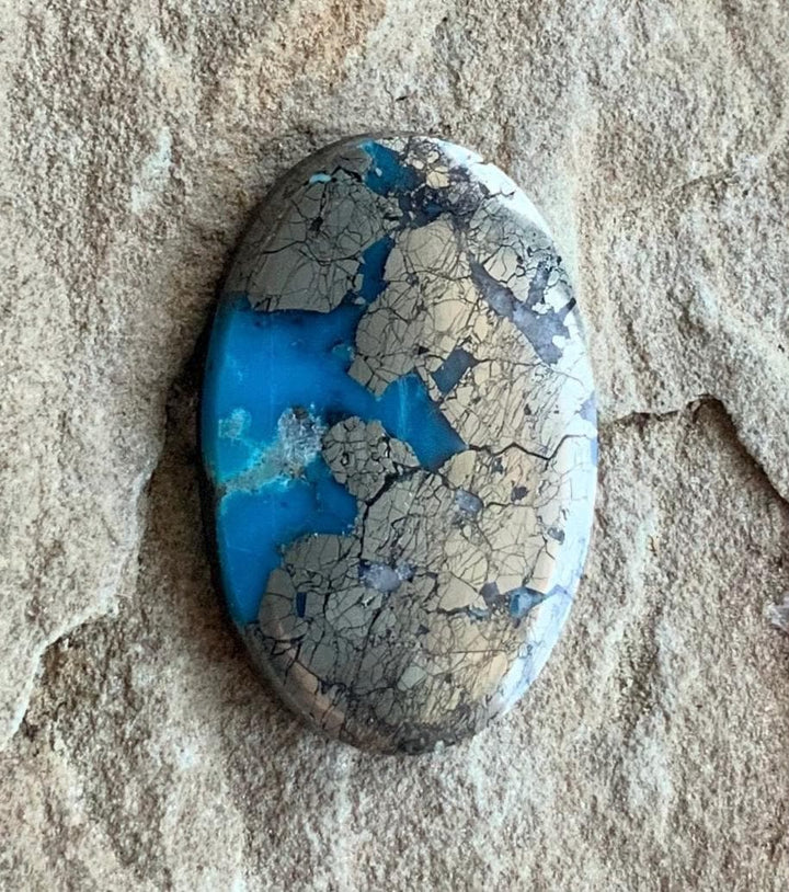 Incredible High Grade Ithaca Peak Turquoise Oval Cabochon Loaded With Silver Pyrite IP116
