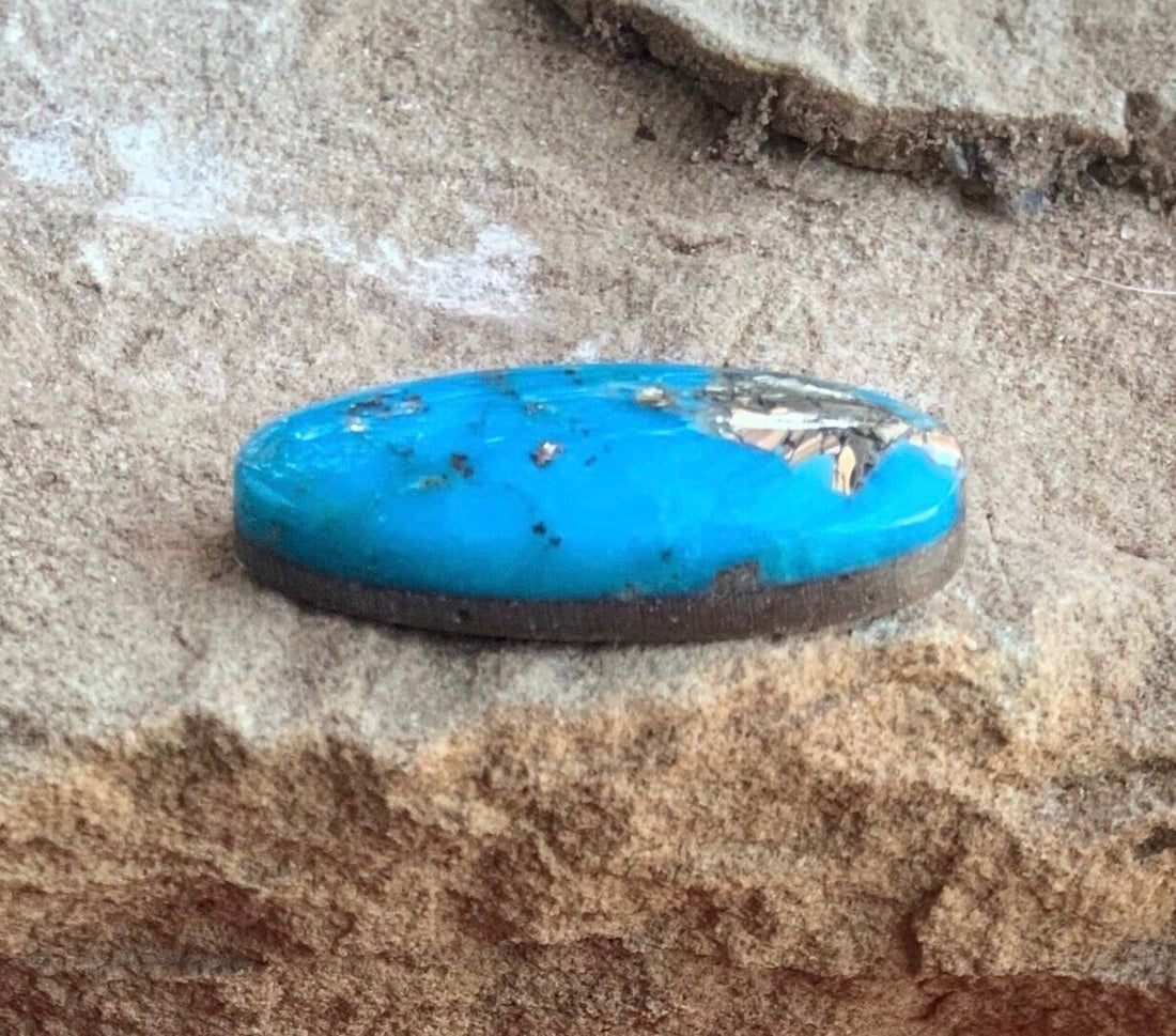 Beautiful Blue High Grade Ithaca Peak Turquoise Long Oval Cabochon With Silver Pyrite