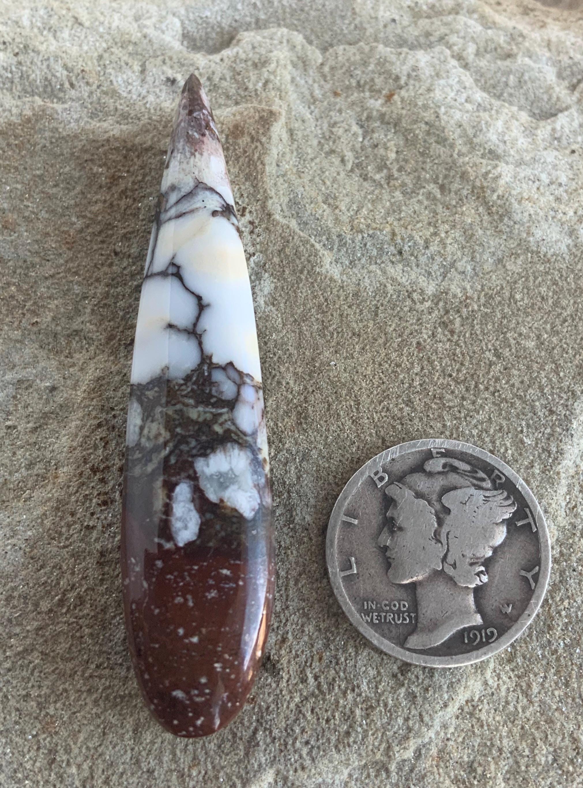 Incredible Wild Horse Magnesite Talon Cabochon