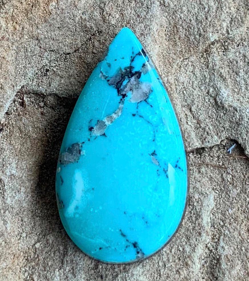 High Grade Ithaca Peak Turquoise Teardrop Cabochon With Quartz Inclusions