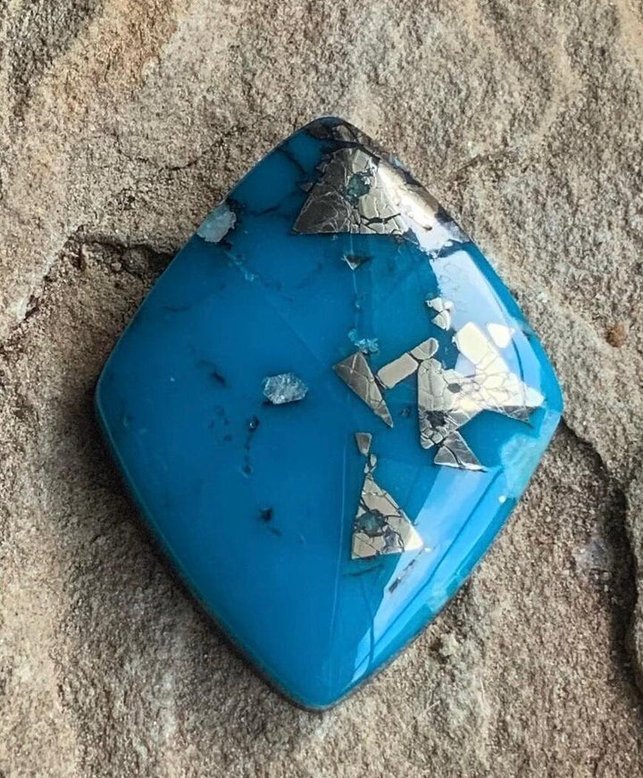 Large High Grade Ithaca Peak Turquoise Cabochon with Pyrite IP258