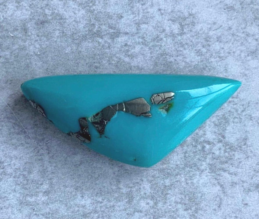Beautiful Thick Cut Ithaca Peak Triangular Cabochon With Pyrite 253