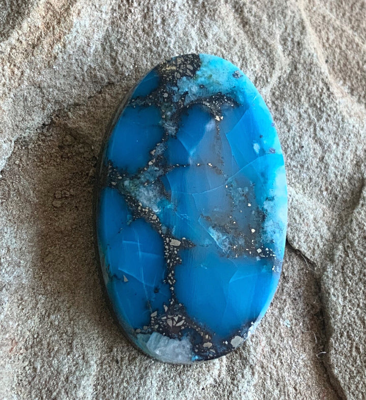 High Grade Ithaca Peak Turquoise Oval Cabochon With Quartz & Pyrite Inclusions