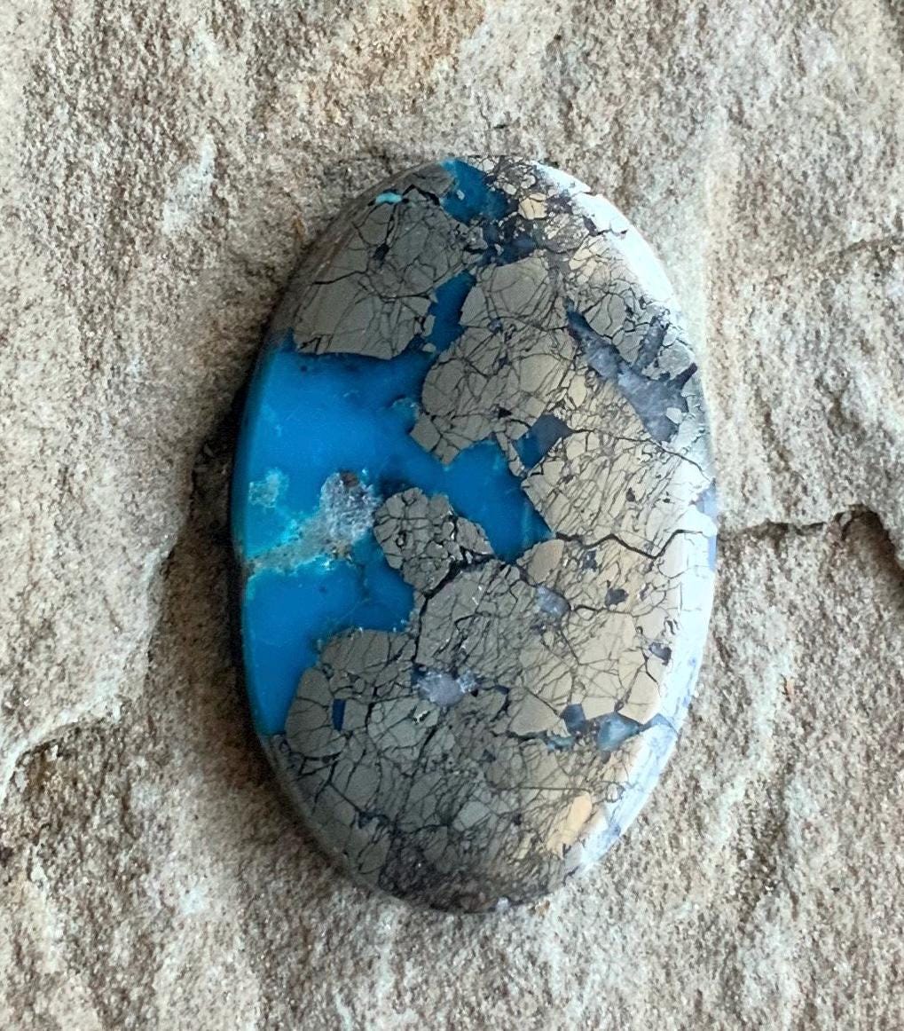 Ithaca Peak Turquoise High Grade Oval Cabochon Loaded With Silver Pyrite IP116