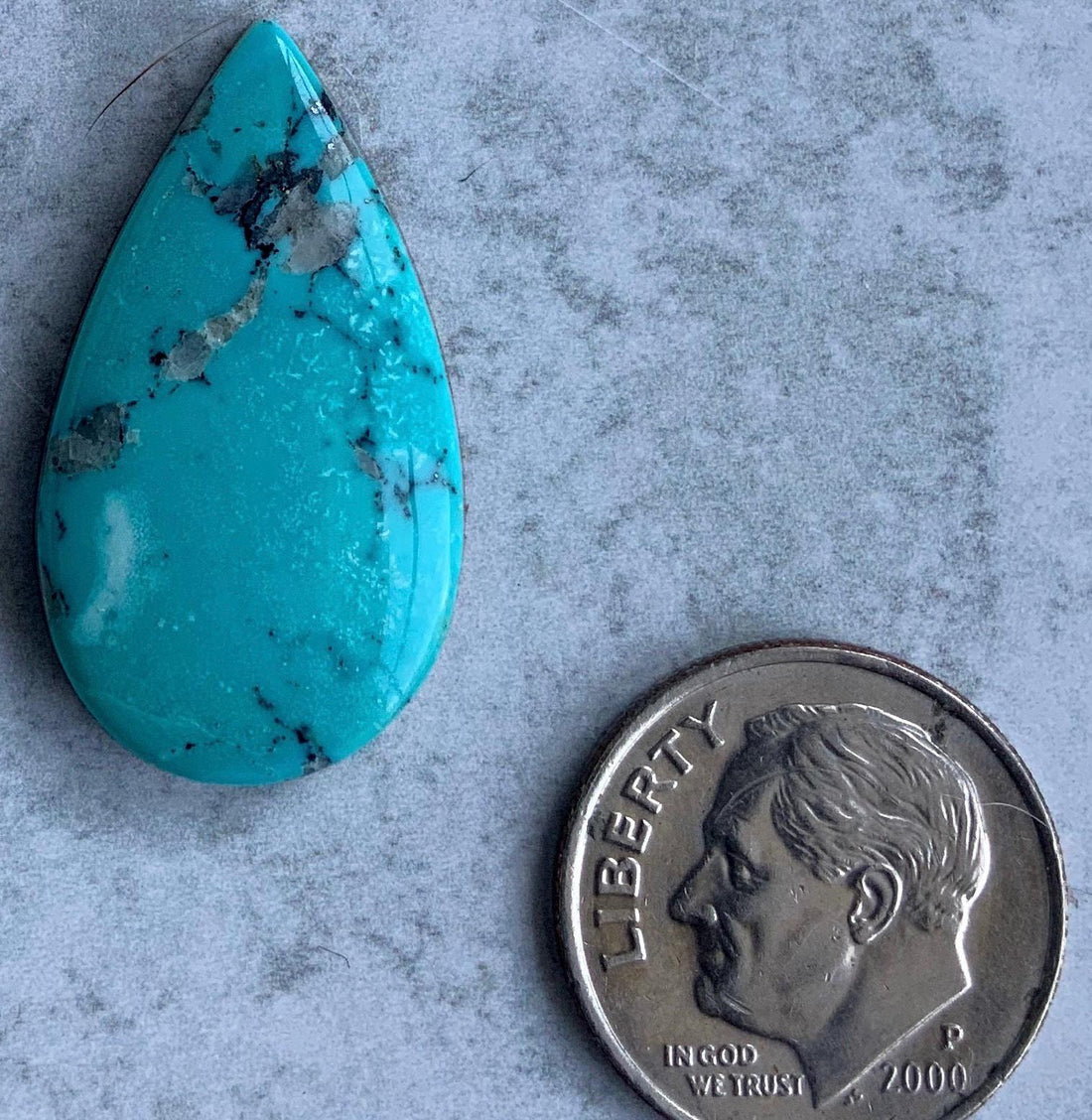 High Grade Ithaca Peak Turquoise Teardrop Cabochon With Quartz Inclusions