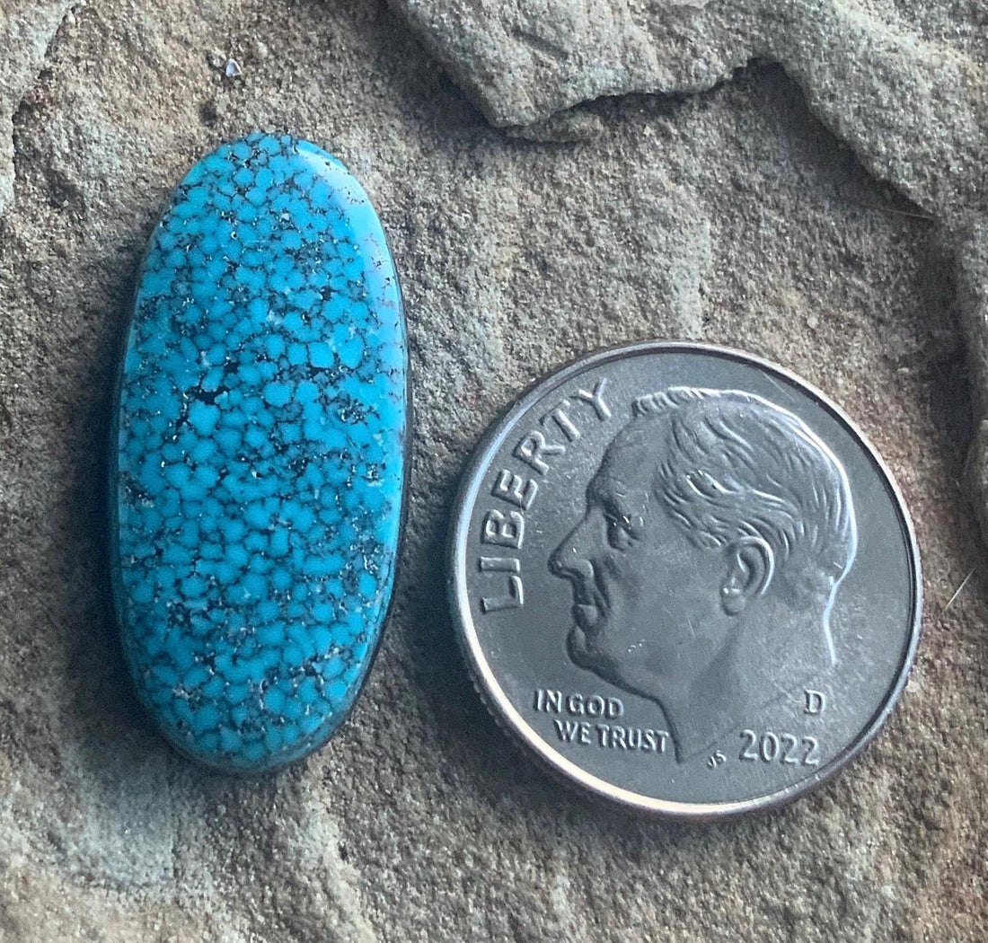 High Grade Black Web Kingman Turquoise Cabochon