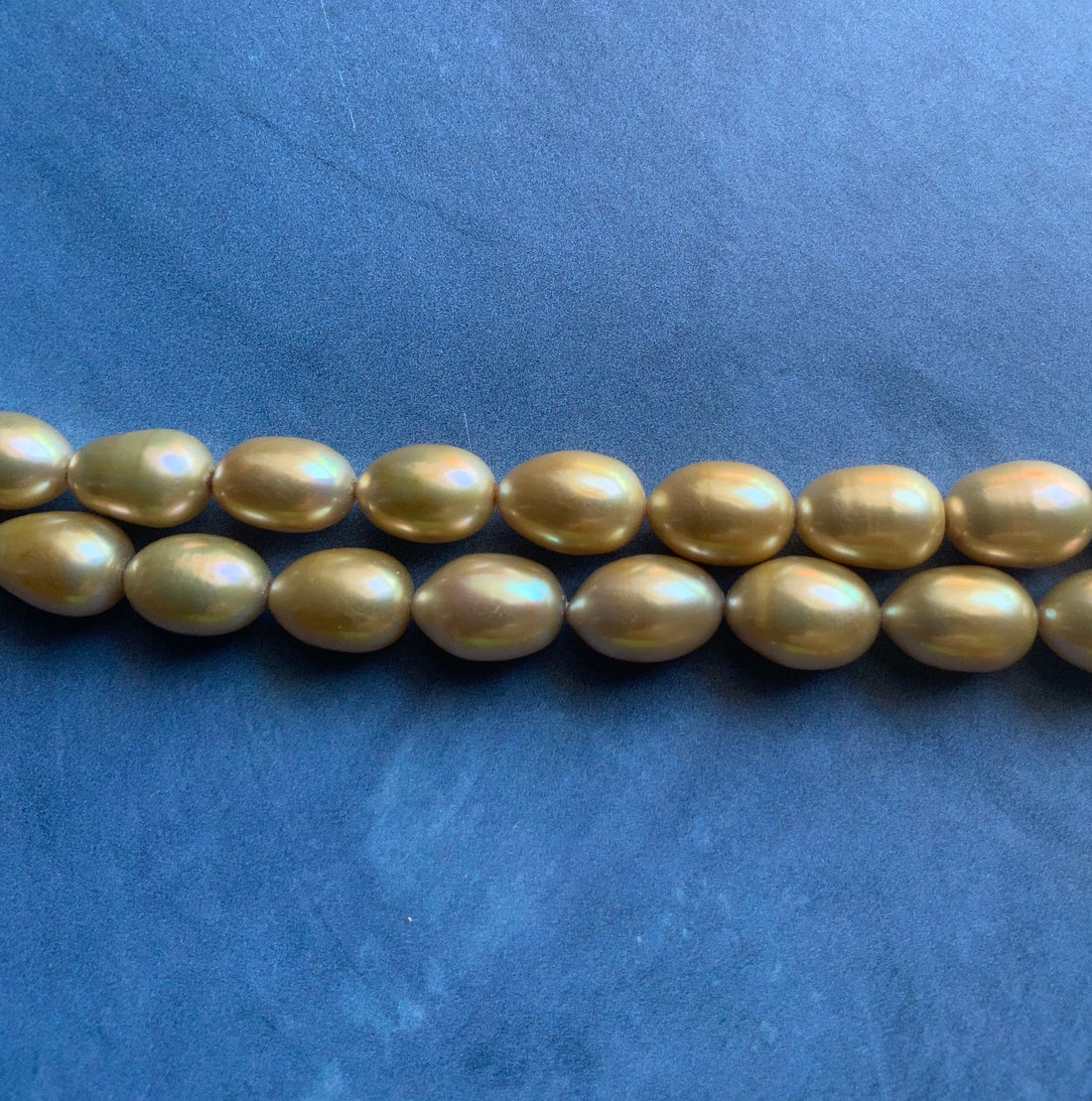 Beautiful Large AAA Large Champagne Gold Oval Rice Shaped Freshwater Pearl Strand