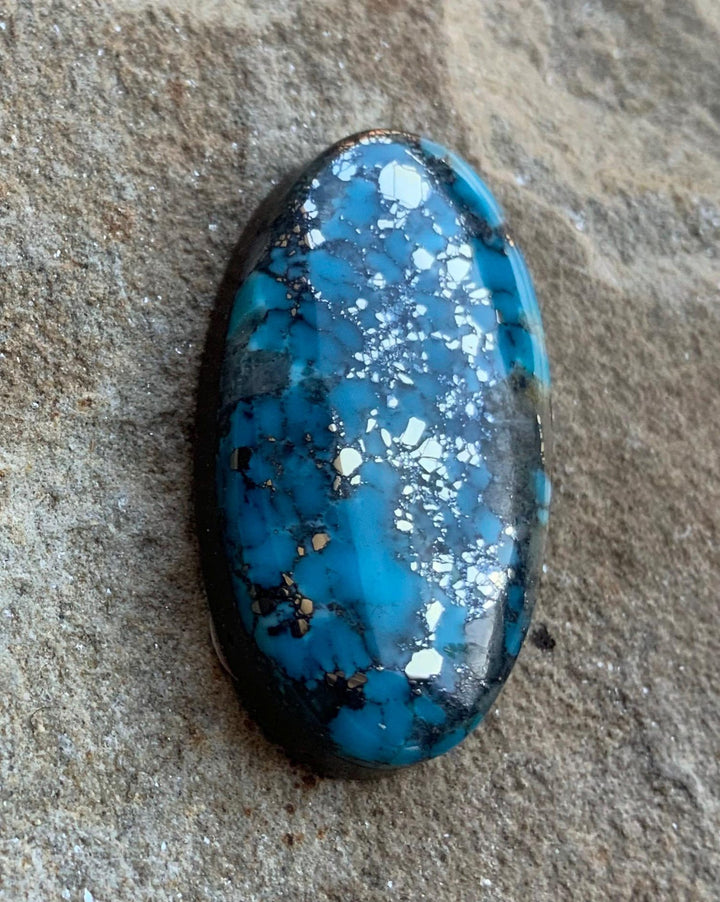 Ithaca Peak High Grade Turquoise Oval Cabochon With Silver Pyrite & Quartz Inclusions