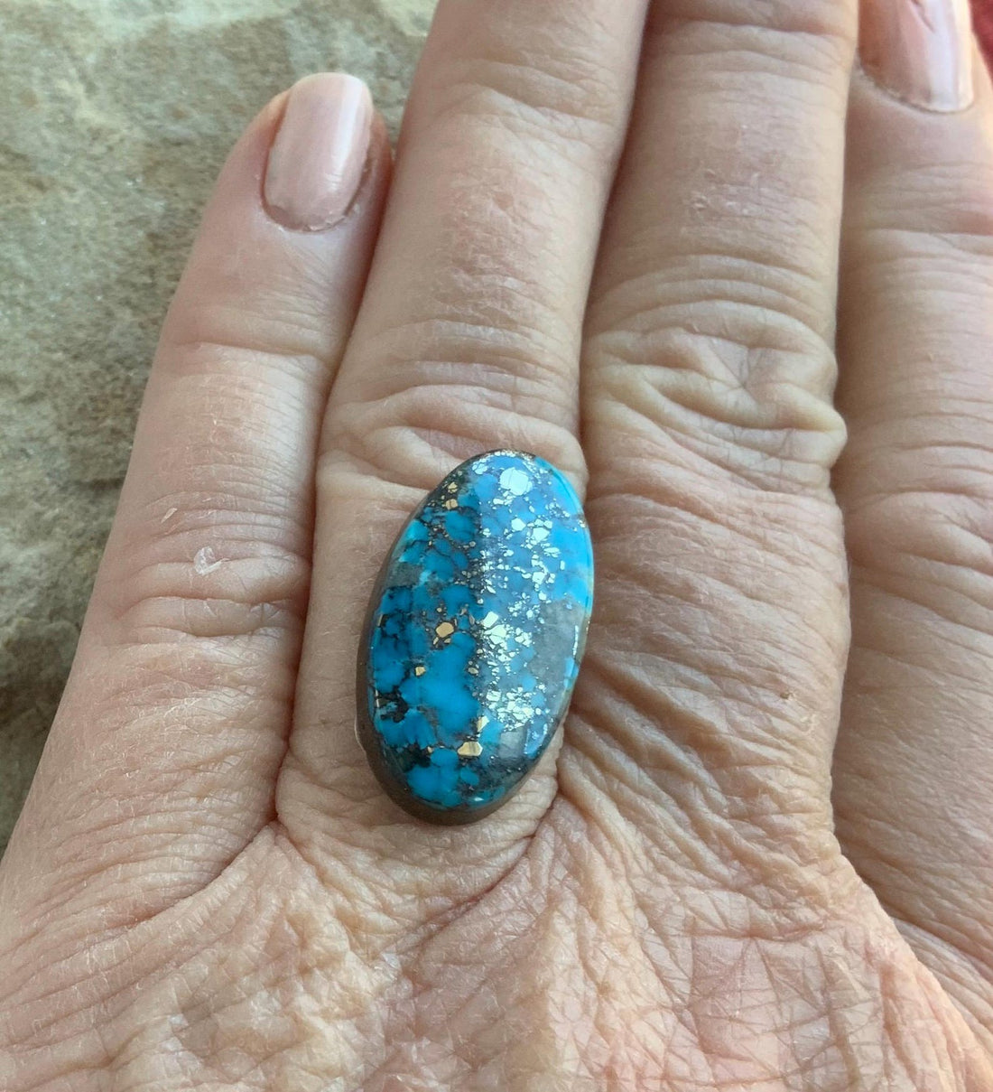 Ithaca Peak High Grade Turquoise Oval Cabochon With Silver Pyrite & Quartz Inclusions