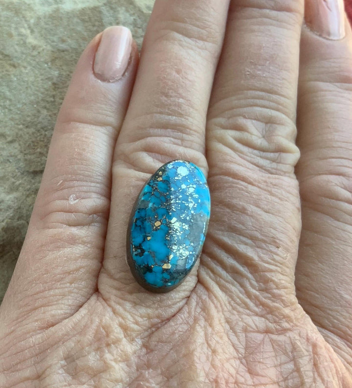 Ithaca Peak High Grade Turquoise Oval Cabochon With Silver Pyrite & Quartz Inclusions