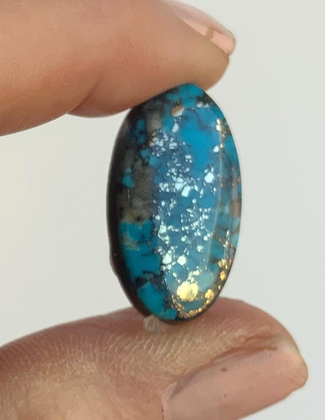 Ithaca Peak High Grade Turquoise Oval Cabochon With Silver Pyrite & Quartz Inclusions