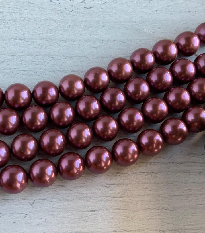 Beautiful Strand of 14 mm Purple Shell Pearls
