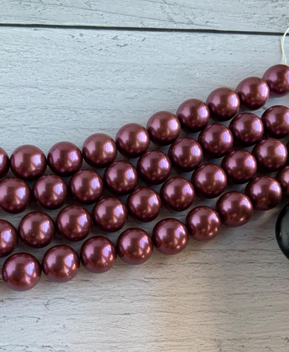 Beautiful Strand of 14 mm Purple Shell Pearls